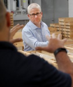 U.S Rep. Patrick McHenry looking over spodumene core samples.